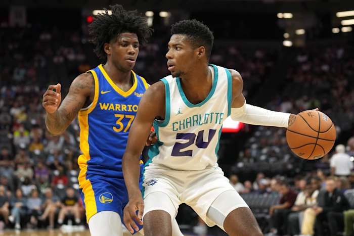 Jul 5, 2023; Sacramento, CA, USA; Charlotte Hornets forward Brandon Miller (24) dribbles against Golden State Warriors guard Kendric Davis (37) during the fourth quarter at Golden 1 Center. Mandatory Credit: Darren Yamashita-USA TODAY Sports
